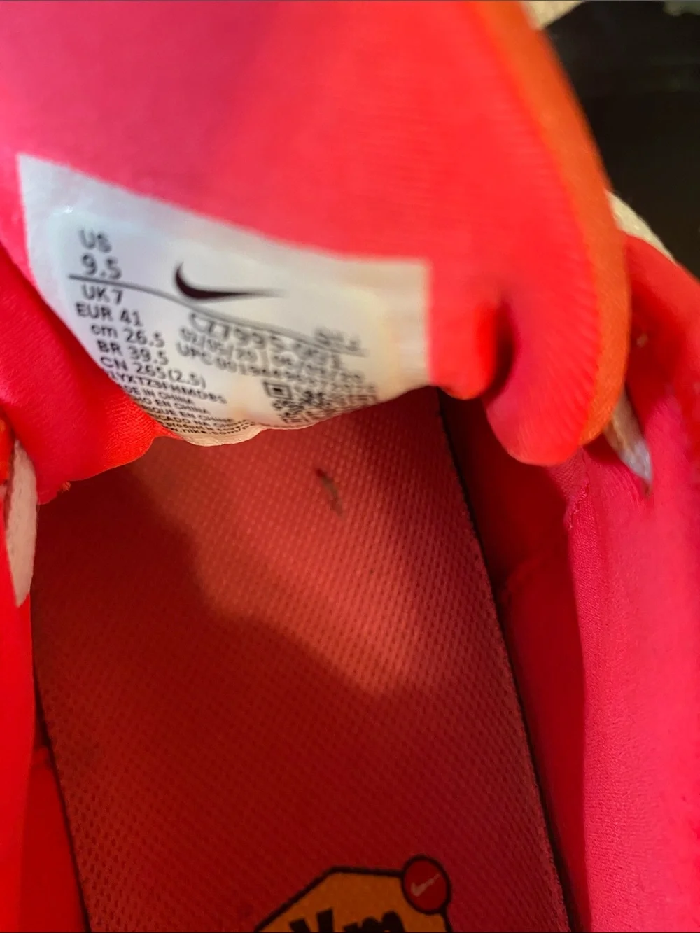 Nike Women’s Pink and White Air VaporMax Plus Sneakers